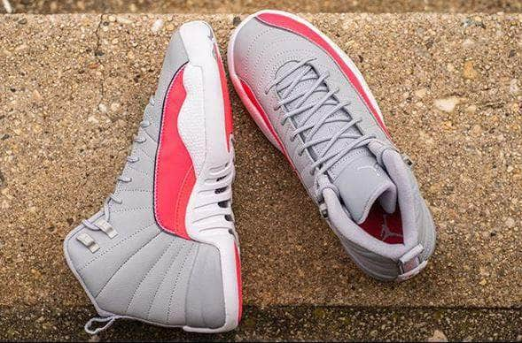 Jordan 12 white on sale pink