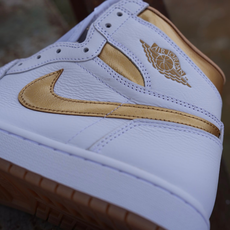 aj1 metallic gold on feet