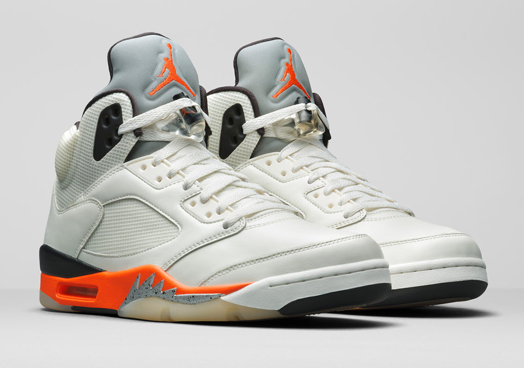 Pair of orange and creamy white Jordan 5s Air Jordan 5 Sail Orange Blazer DC1060-100 Release  main image 4