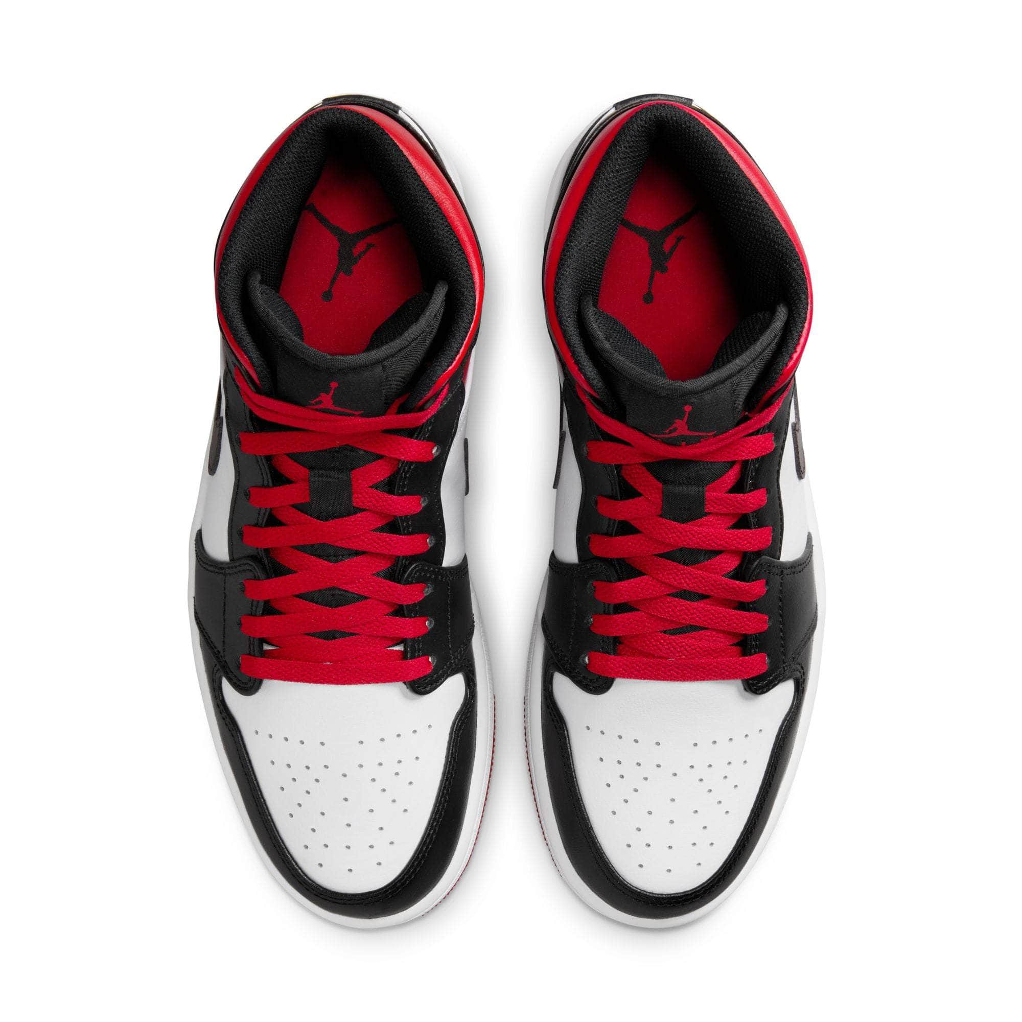 Jordan air 1 mid black toe hot sale