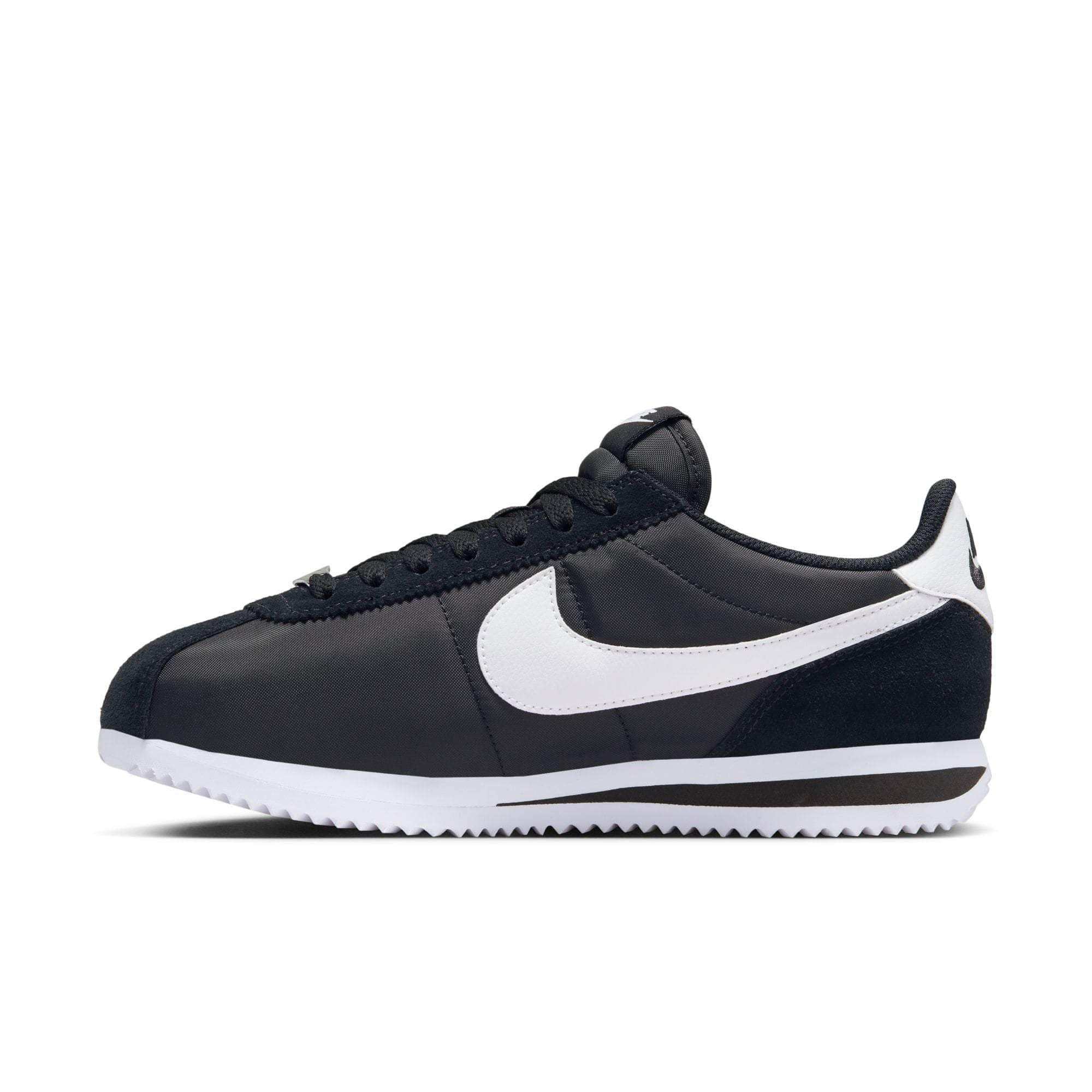 Nike cortez black top and white womens